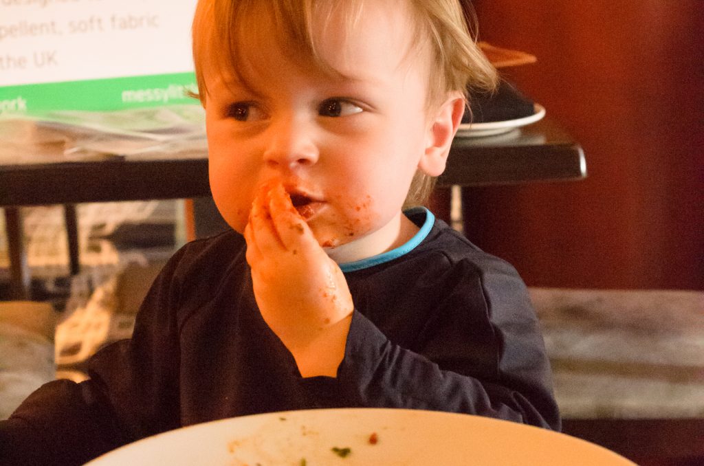 Jonah enjoying his pasta