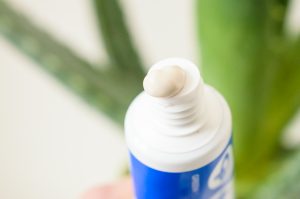 Open tube of Green People Spearmint and Aloe Toothpaste
