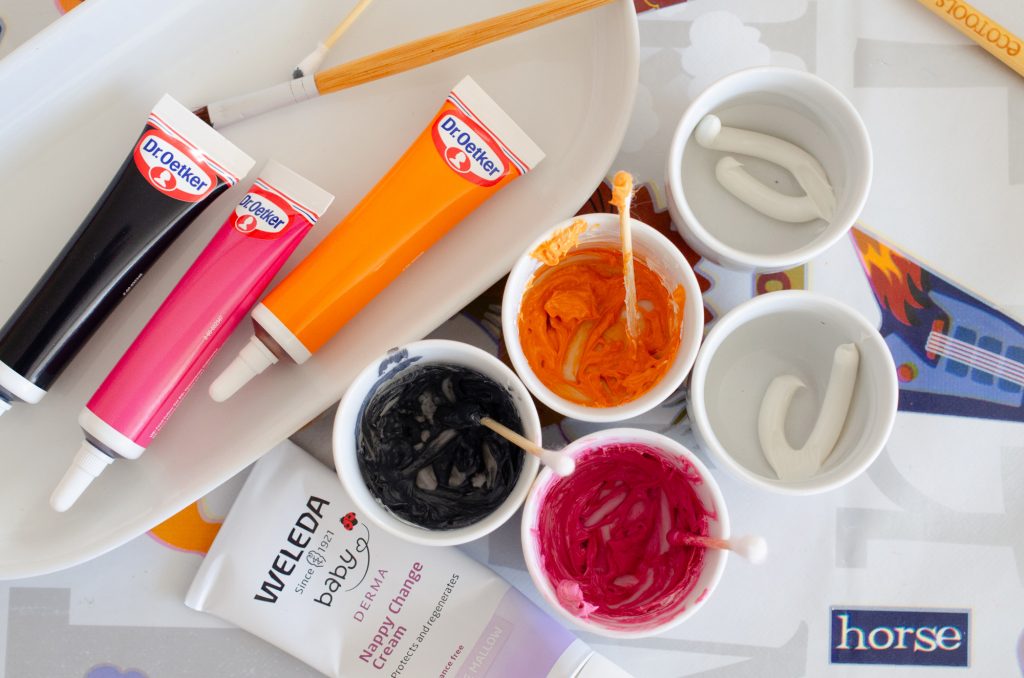 The finished face paints in spooky Halloween colours!