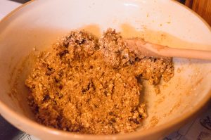 Add the oats, cranberries, and raisins