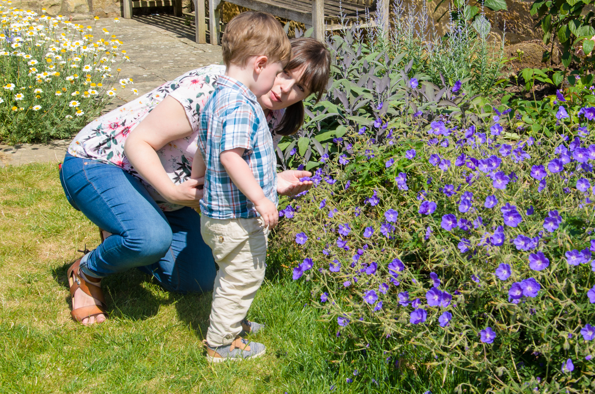 Mummy and Jonah looking at flowers together