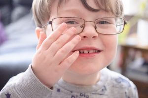 Jonah wearing daddy's glasses