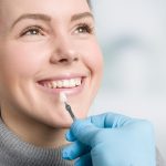The Secret to a Brilliant Smile: Exploring the Benefits of Porcelain Veneers