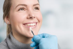 The Secret to a Brilliant Smile: Exploring the Benefits of Porcelain Veneers