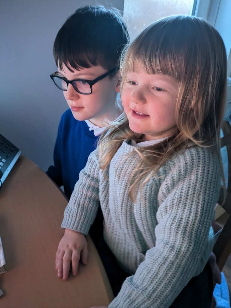 Jonah and Lydia on the computer