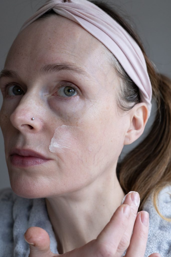 Applying my moisturiser with the glow drops.