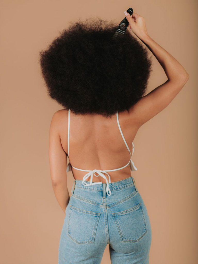 Removing tangles 4C hair with a comb