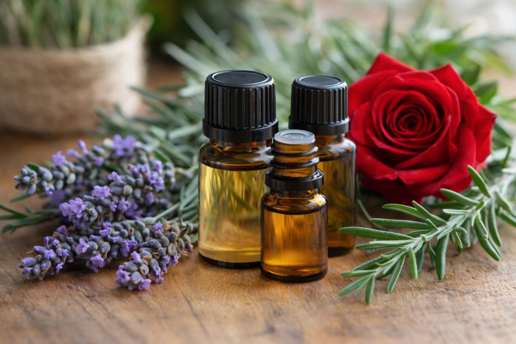 A selection of sensual essential oils including rose and lavender