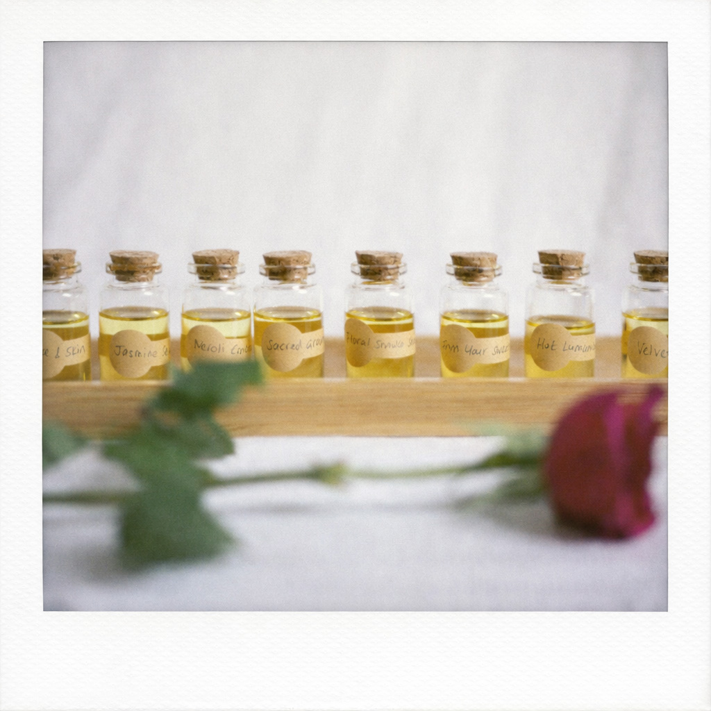 My own blends of sensual essential oils in tiny clear bottles